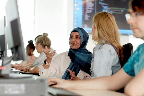 Computer Science student listening to academic in CSL at Keele 